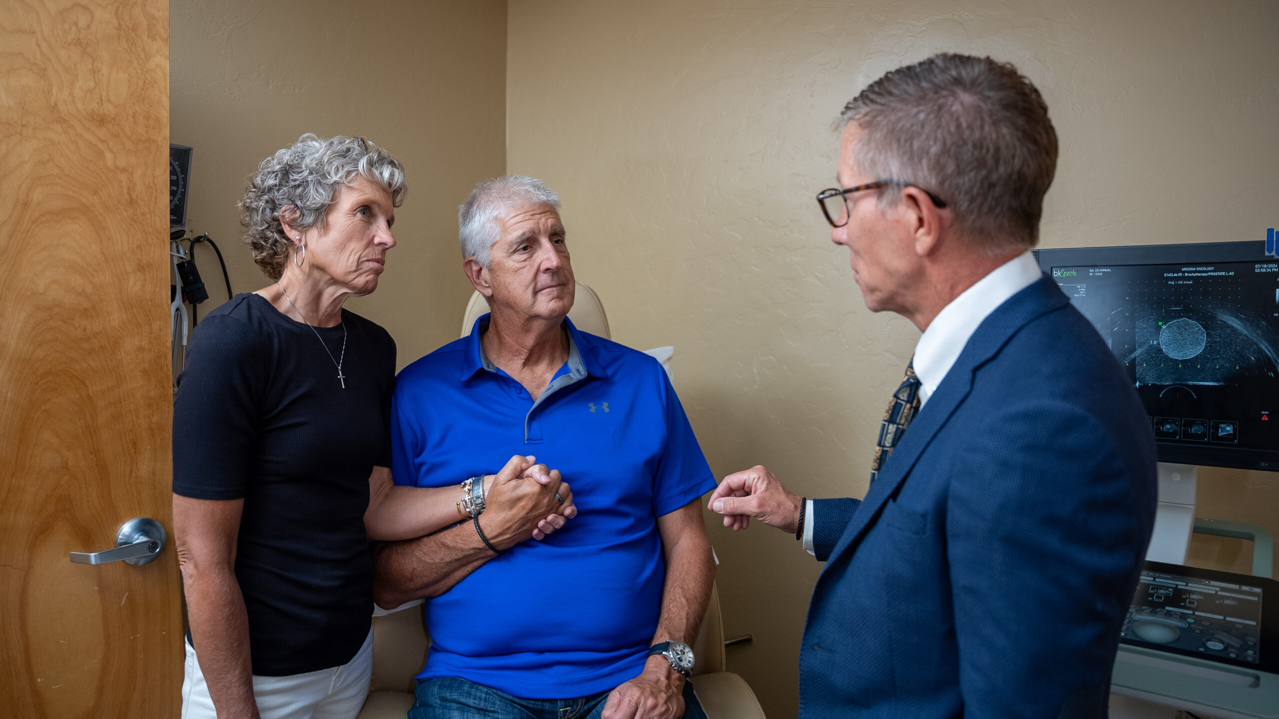 Dr. Curtis Mack of Arizona Oncology talks to prostate cancer patient and his wife.